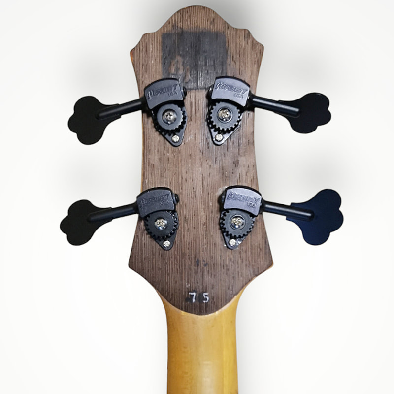 rear of headstock also veneered to hide horrid damage
